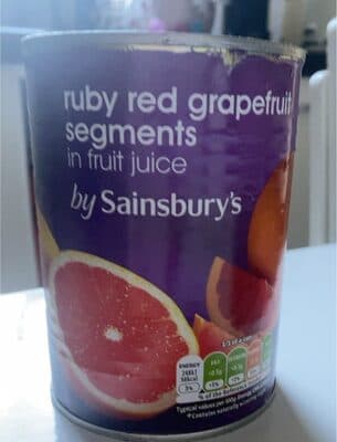 Ruby red grapefruit segments in fruit juice