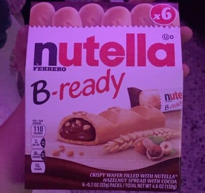 Crispy wafer filled with Nutella hazelnut spread with cocoa