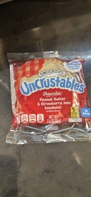 Peanut Butter & Strawberry Jam Sandwich on Wheat Bread